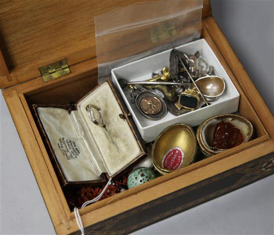 Two gold rings, a pair of amber earrings and other jewellery including charms and seals.